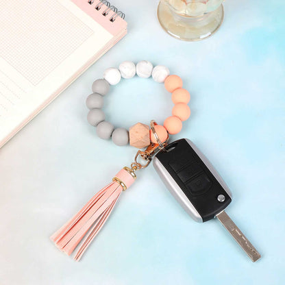 BAOSIWA Silicone Beaded Bracelet Keychain Wristlet Key Ring Bangle Chains for Women with Leather Tassel